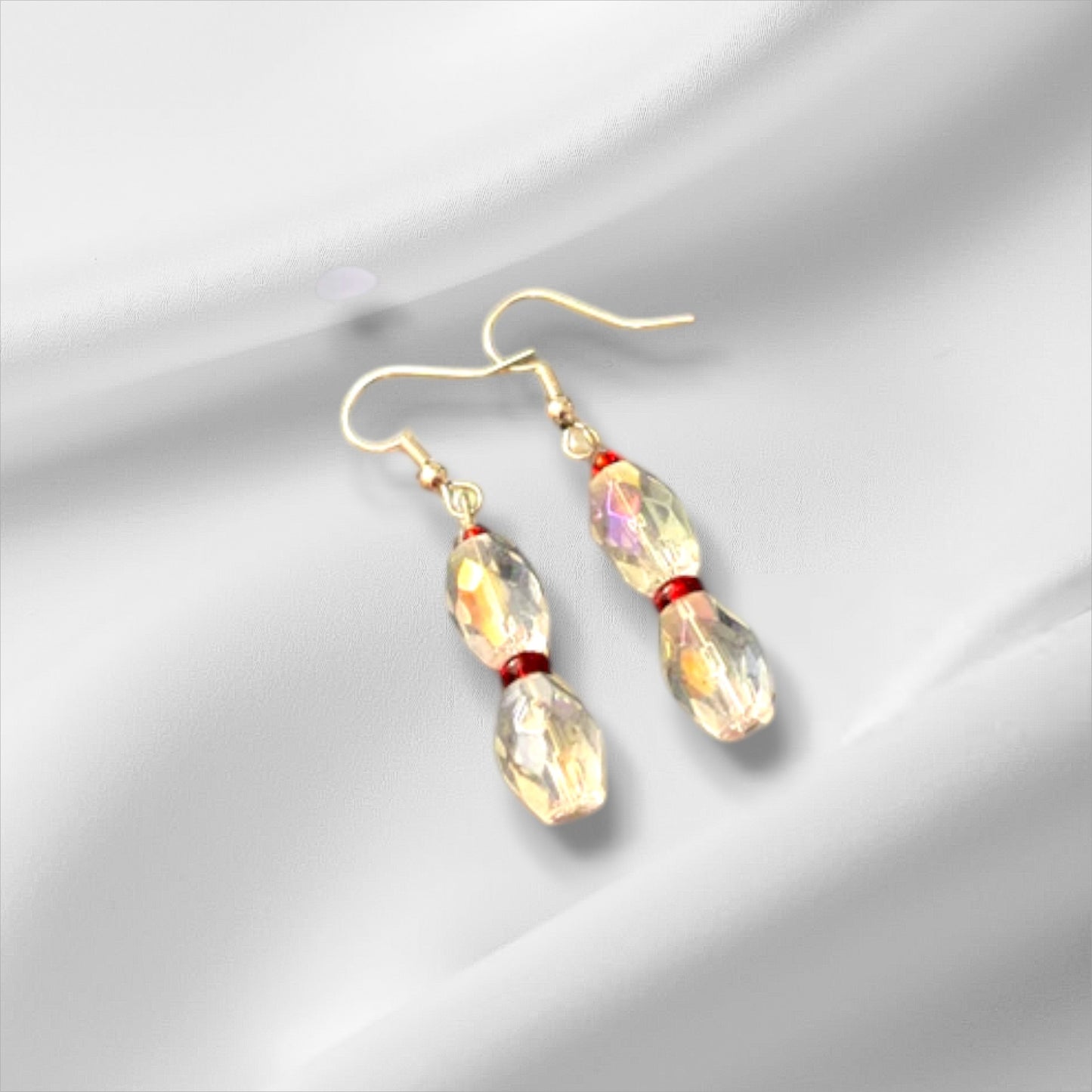 Clear and red earrings